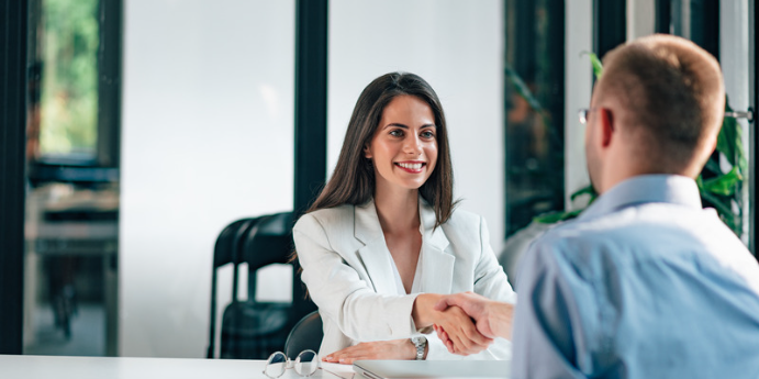 hr person and employers welcoming a new recruit