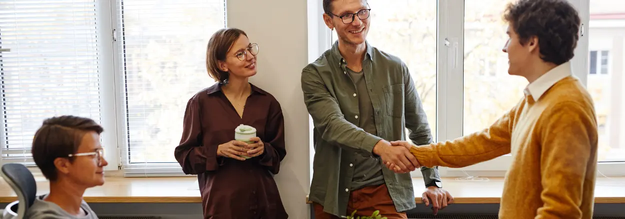 New colleague is welcomed at his first week at work