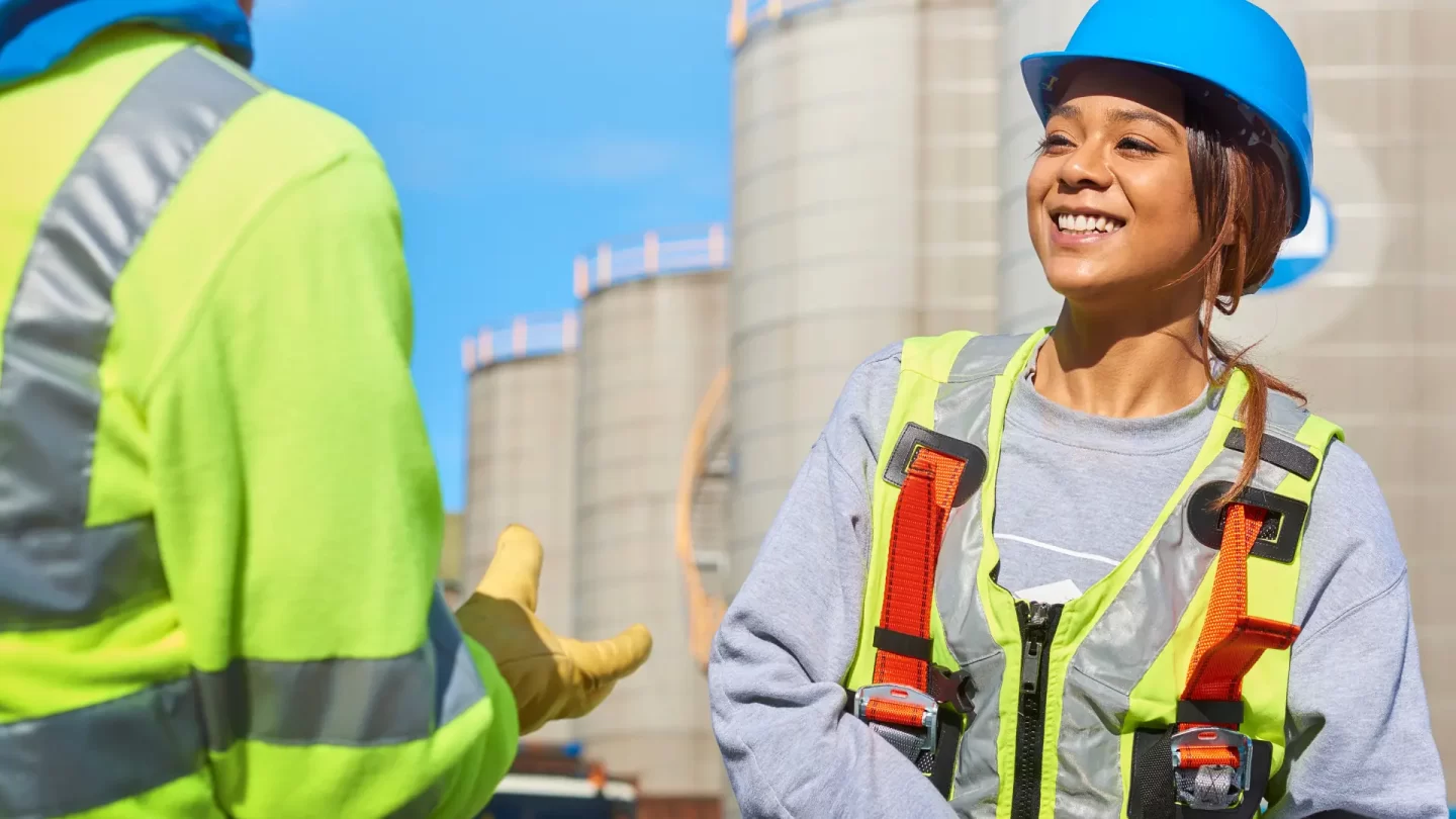 woman engineer interacting with coworker